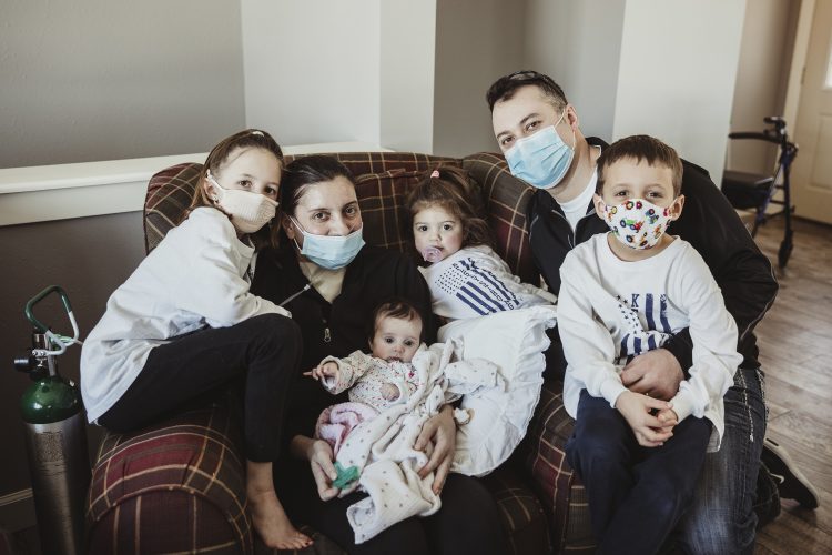 Wisconsin mother meets baby delivered during COVID-19 coma ...